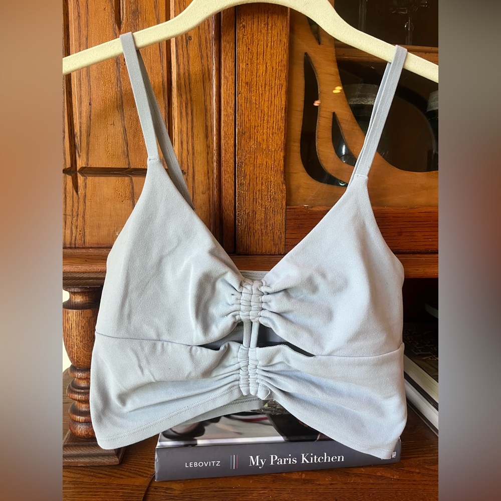 Light blue workout tank top with cutouts